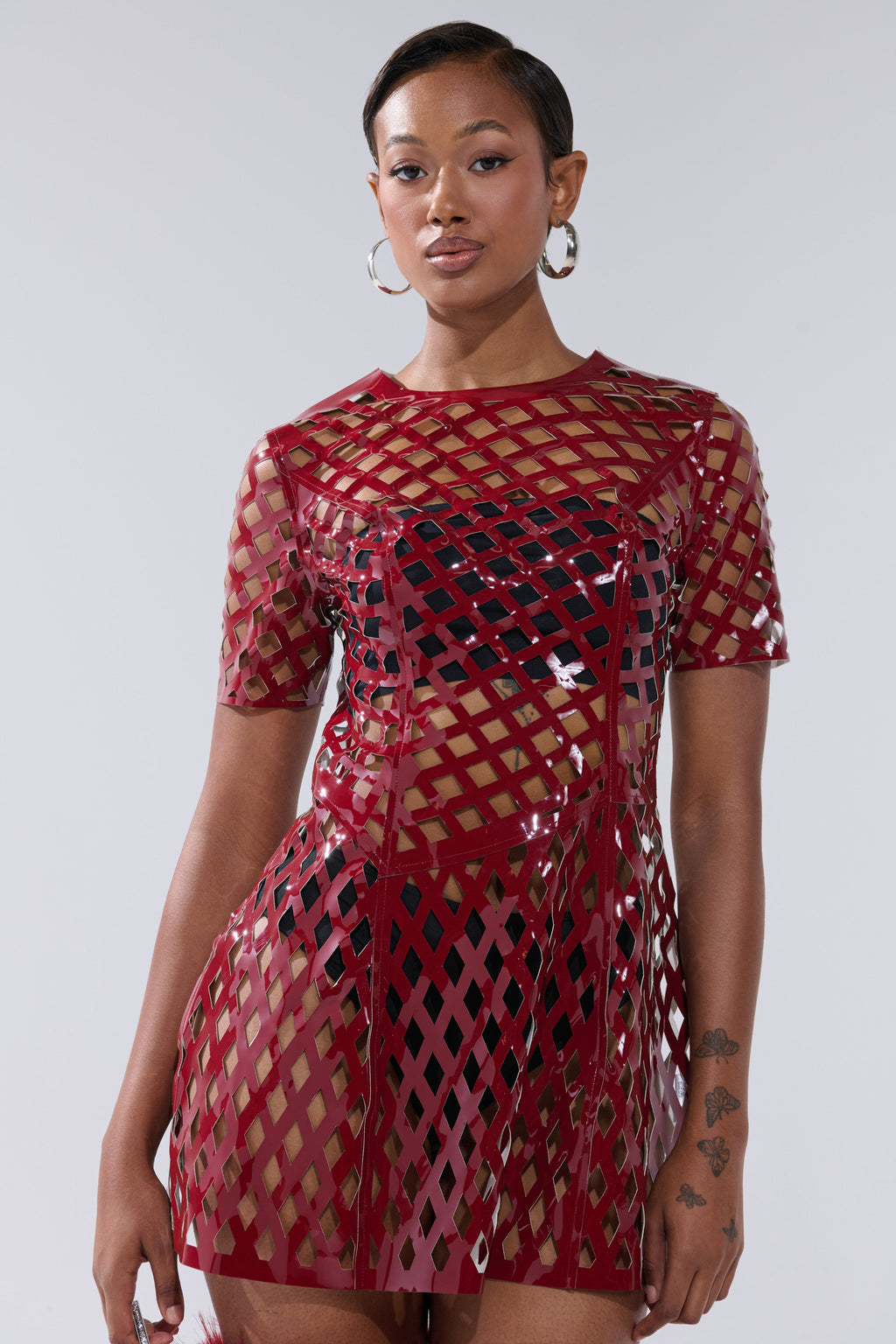 SHE'S DIFFERENT CUT OUT FAUX LEATHER MINI DRESS IN BURGUNDY